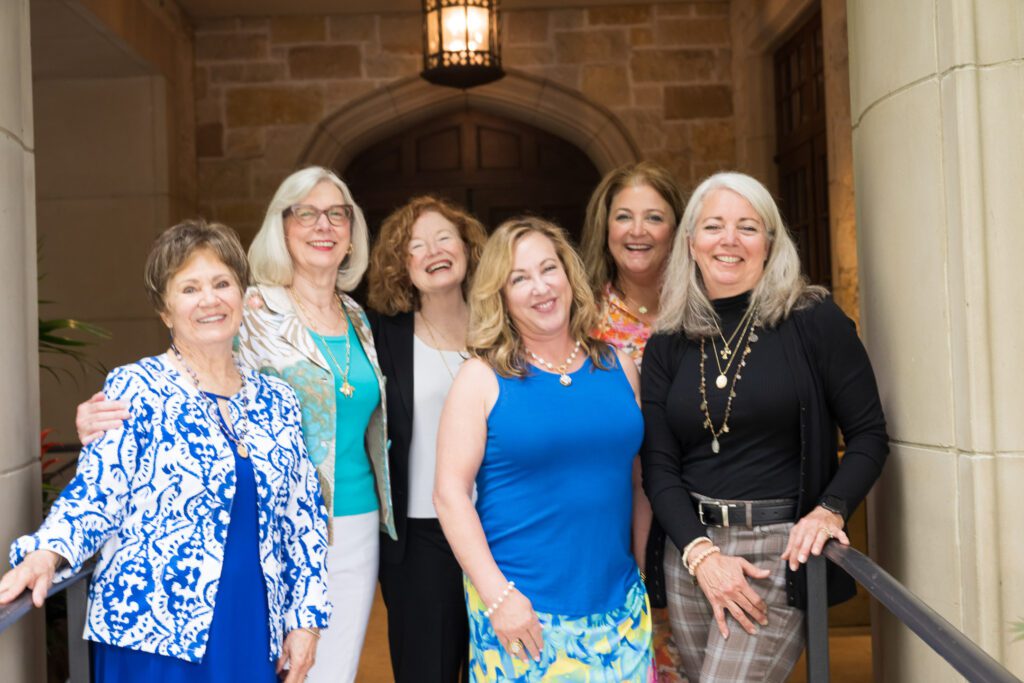 Group of women outside smiling for a photo