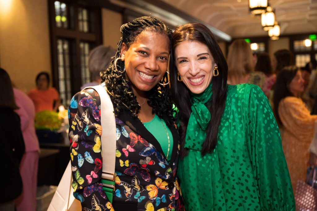 Two women smiling