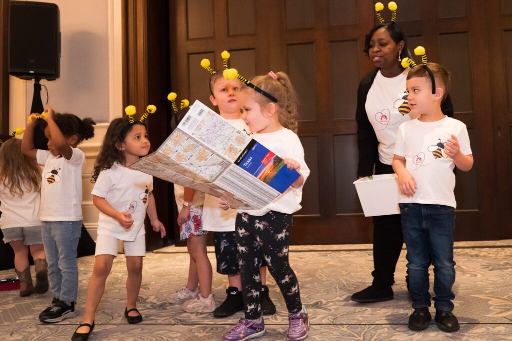 Children in bee antennae headbands 