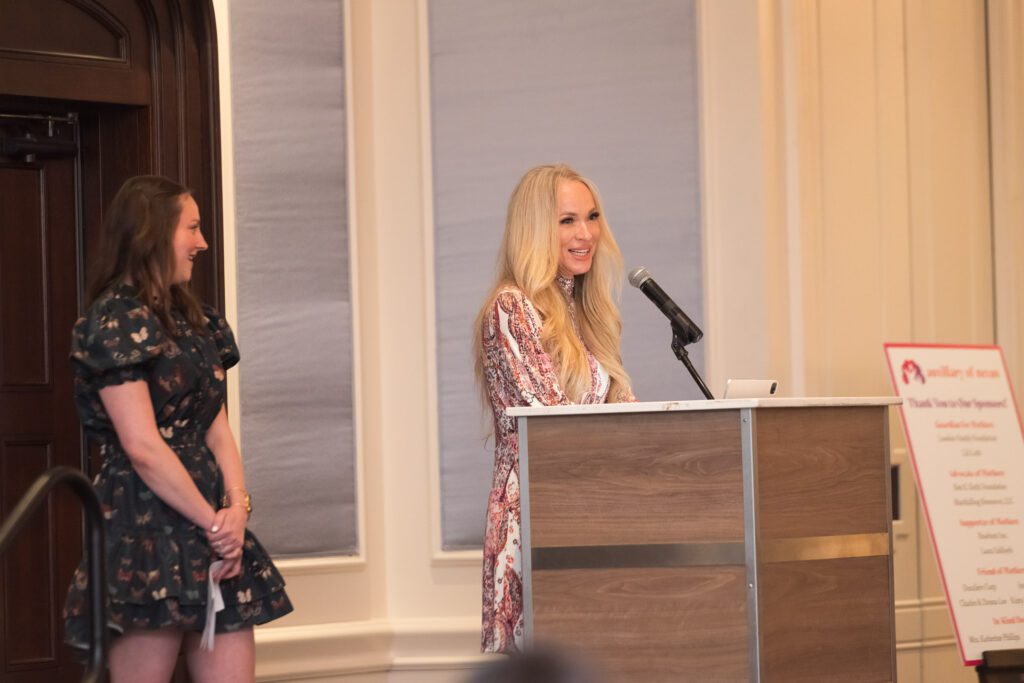 Women at a podium