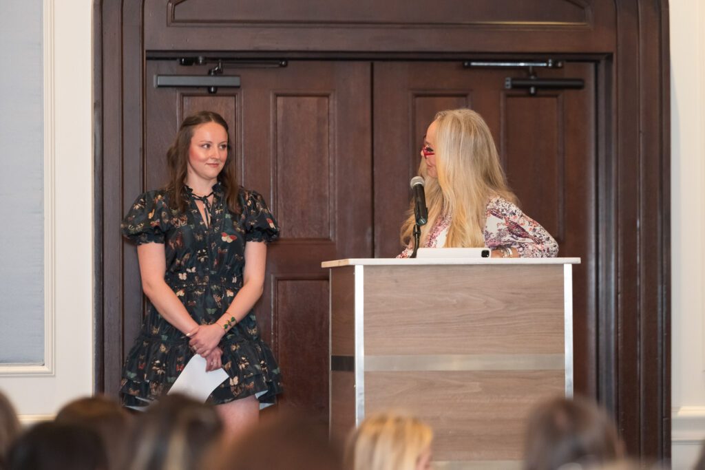 Women at a podium