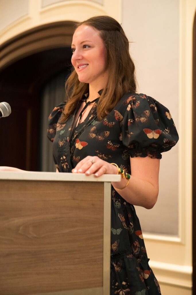 Woman at a podium