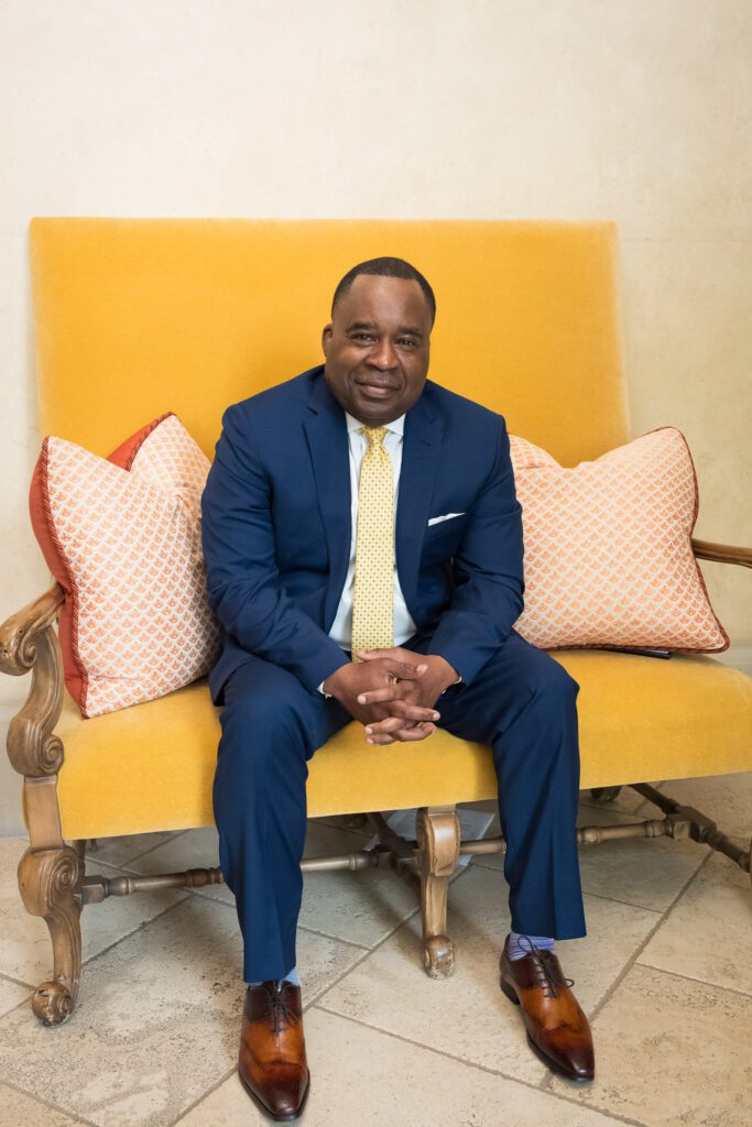 Man sitting on a large chair