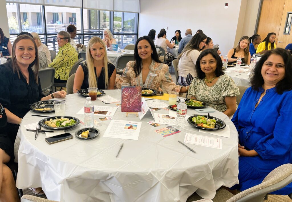 Pathways guests seated at table