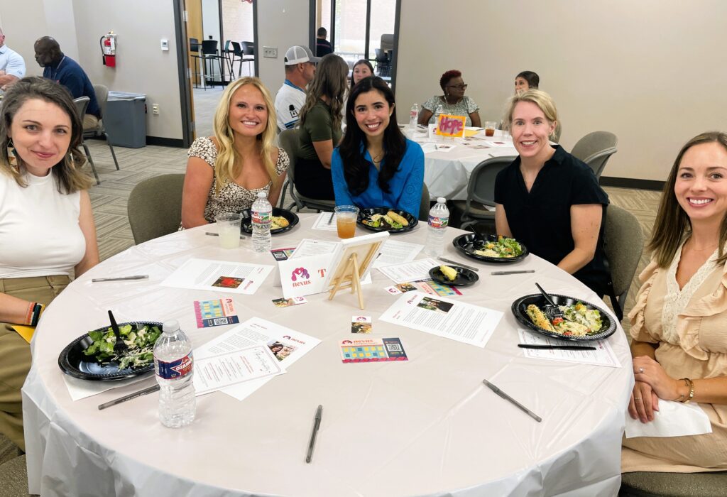 Pathways guests seated at table