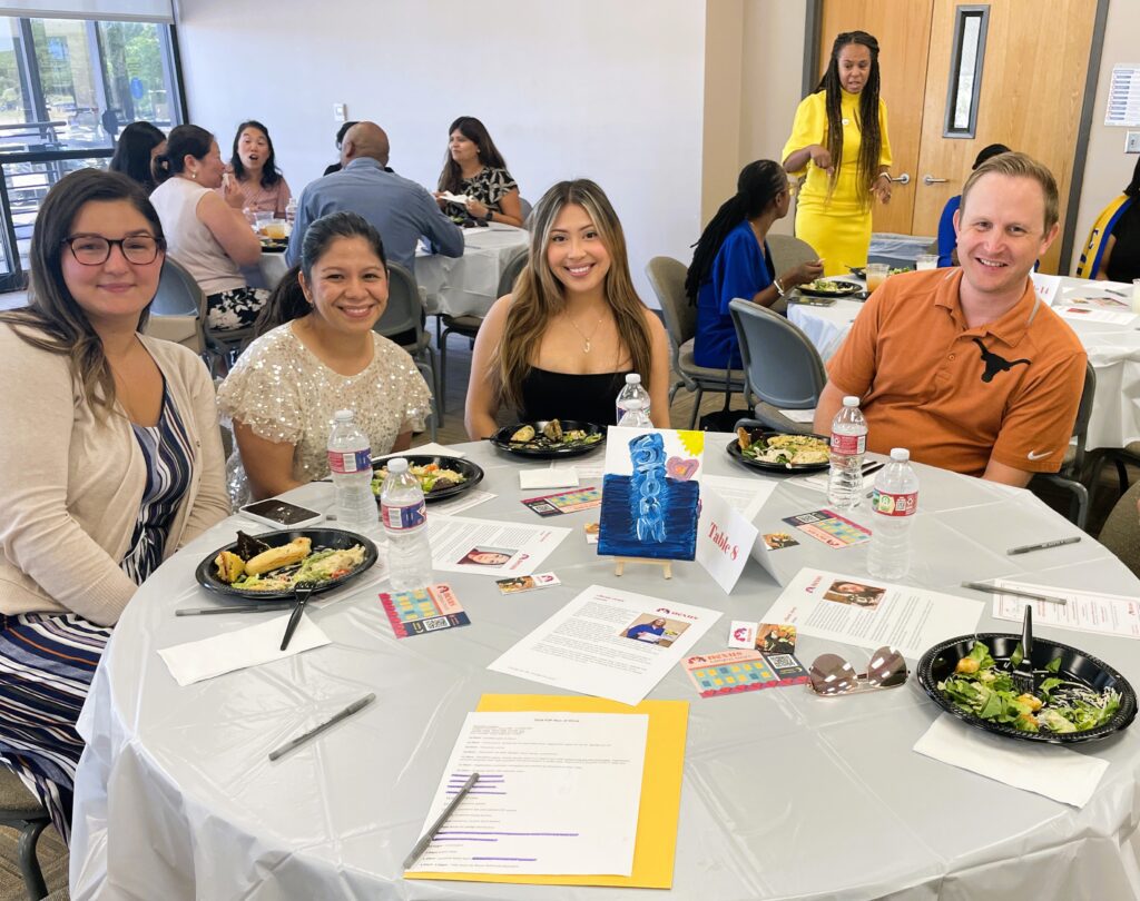 Pathways guests seated at table