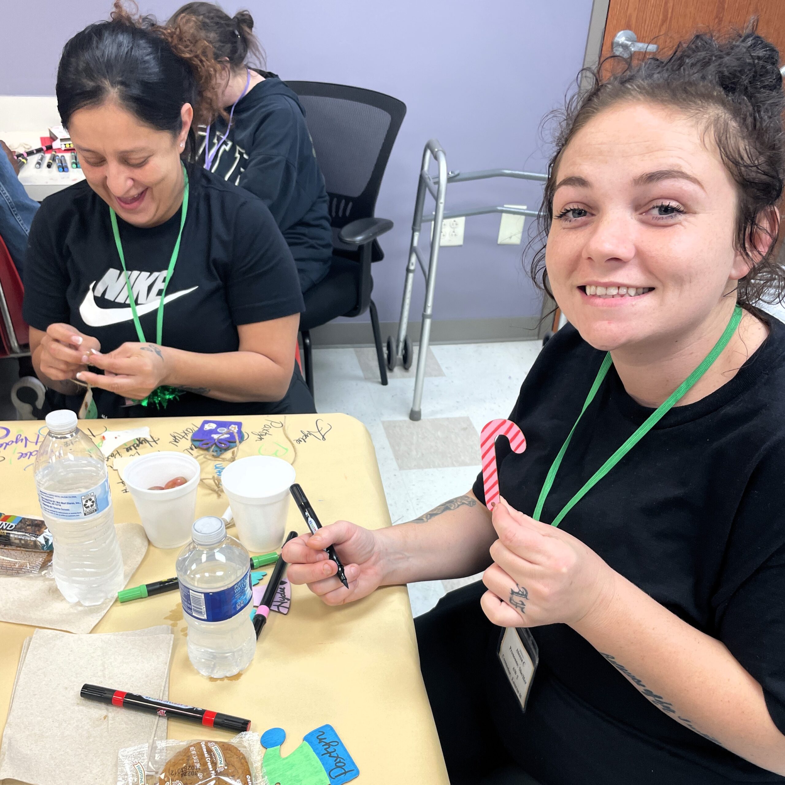 woman smiling making art